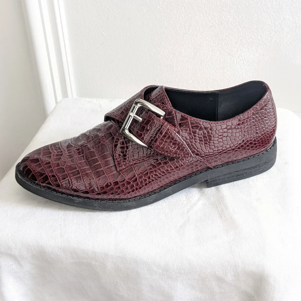 Patent leather loafers by Aldo
